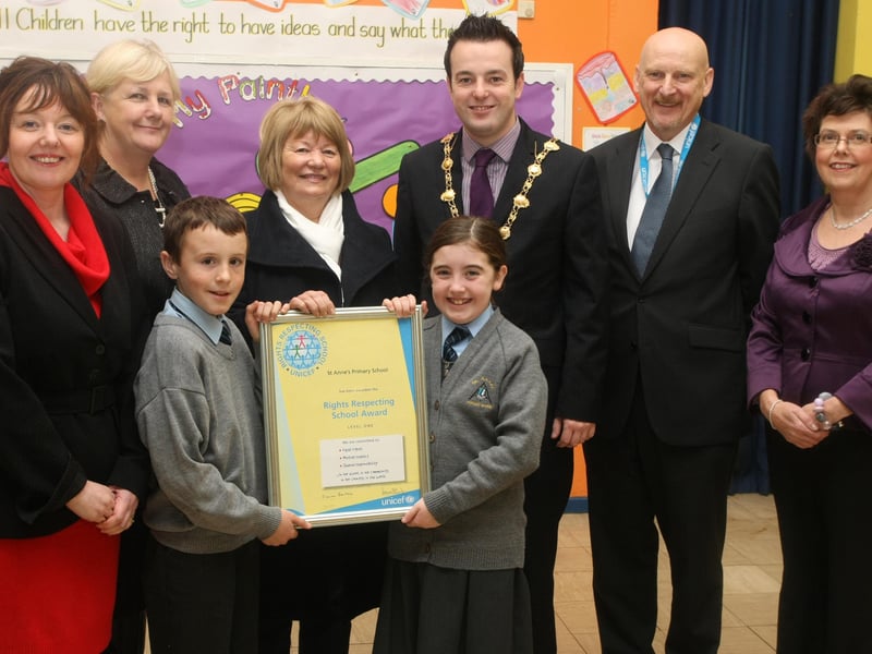 St. Anne's PS, Rosemount pupils Nathan Morrison and Eireann Hickey being presented with the prestigious UNICEF's Rights Respecting School Award from Geraldine O'Kane, UNICEF Rights Respecting Schools Partner, at the school on Tuesday morning. From left are, Siobhan Gillen, vice principal, St. Anne's PS, Breige McLaughlin, WELB curriculum Advisory Support Service, Mayor of Derry, Councillor Colum Eastwood, David McGimpsey, WELB and Katrina Martin, Learning Support Assistant. 2910JM01