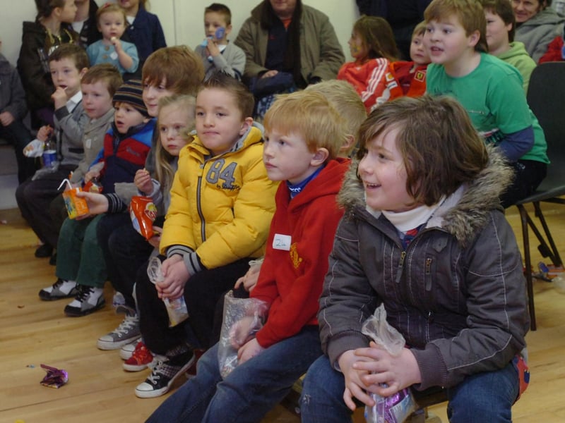 Children enjoy Parky the Magician during the Steelstown Brian Og's Christmas party. (0712PG02)