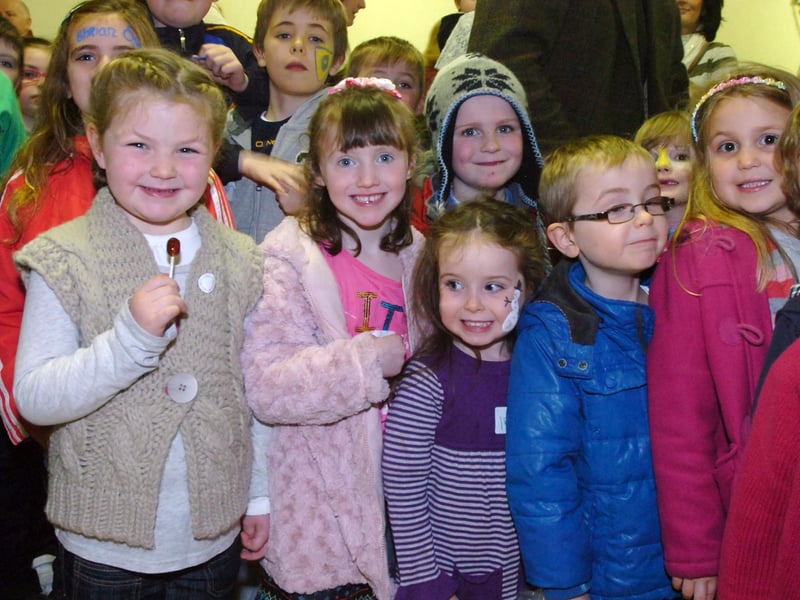 Children at the Steelstown Brian Og's Christmas party can't wait to get a present from Santa. (0712PG06)
