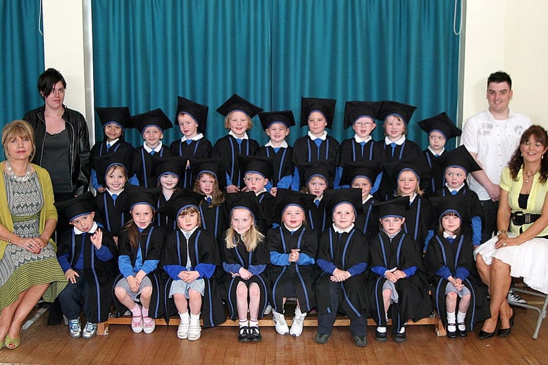 The graduates from Termoncanice Nursery school morning group, are pictured with schools  vice principal Mrs Mary Harron, nursery leader Ann Marie Diamond with assistants Hilary Hargan, Niall McAteer and Charlene Howe. PIcture Inpresspics.com. LV22-412MMCK10