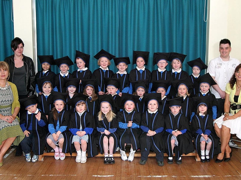 The graduates from Termoncanice Nursery school morning group, are pictured with schools vice principal Mrs Mary Harron, nursery leader Ann Marie Diamond with assistants Hilary Hargan, Niall McAteer and Charlene Howe. PIcture Inpresspics.com. LV22-412MMCK10