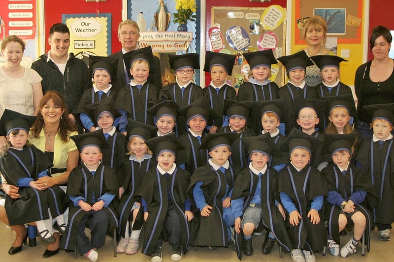 The graduates from Termoncanice Nursery school afternoon group, are pictured with  Mr Seamus Coyle school  principal, l Mrs Mary Harron vice principa,  Ann Marie Diamond nursery leader with assistants Hilary Hargan, Niall McAteer and Charlene Howe.PIcture Inpresspics.com. LV22-424MMCK10