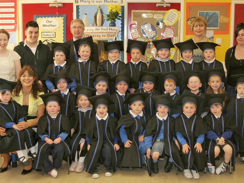 The graduates from Termoncanice Nursery school afternoon group, are pictured with Mr Seamus Coyle school principal, l Mrs Mary Harron vice principa, Ann Marie Diamond nursery leader with assistants Hilary Hargan, Niall McAteer and Charlene Howe.PIcture Inpresspics.com. LV22-424MMCK10