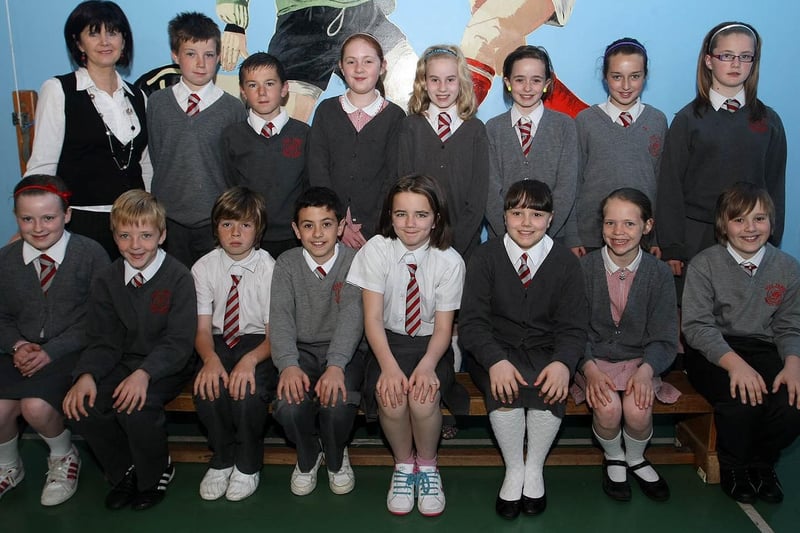 Mrs Higgins, pictured with her P7 class from Holy Family Primary School.  1106GM01