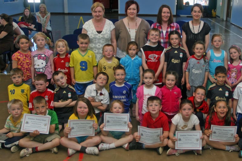 Greenhaw PS P2 pupils who received their Paired Maths Certificates at the school this week. At back are teachers and classroom assistants. 1106JM44