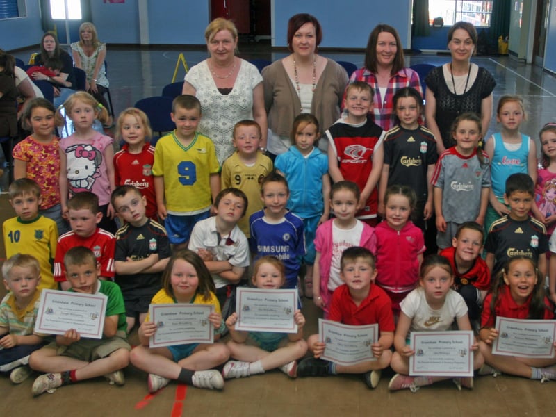 Greenhaw PS P2 pupils who received their Paired Maths Certificates at the school this week. At back are teachers and classroom assistants. 1106JM44