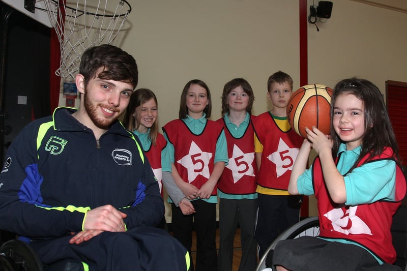 Oakgrove Integrated PS pupils taking part in a Disability Sports Challenge at the school.  They are (from left), Holly Olphert, Sarah McElhinney, Daniel Anderson, Reeves O’Kane and Abbi Nolen, with sports coach Johnny McCarthy. INLS 5010-503MT.