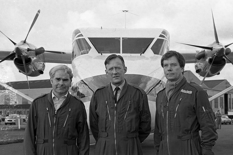 Mr Lindsay Cumming, centre, Shorts chief test pilot, with Mr John Bailie, left, deputy chief flight test engineer, and Mr Peter Rankin, chief flight engineer, pictured before taking the Shorts 360 commuter airline into the air for the first time Belfast harbour airport in June 1981. Picture: News Letter archives