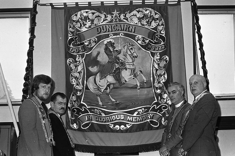 New banner unfurled (May 1981): North Belfast Orange Hall was the scene of the unfurling and dedication of a new banner for Duncairn LOL 1322 No 1 District, by the Reverend Martin Smyth and WM David McGerrity. Also included in the picture are, left, Eddie Wilson, secretary, and Ian McGarrity, treasurer. Picture: News Letter archives