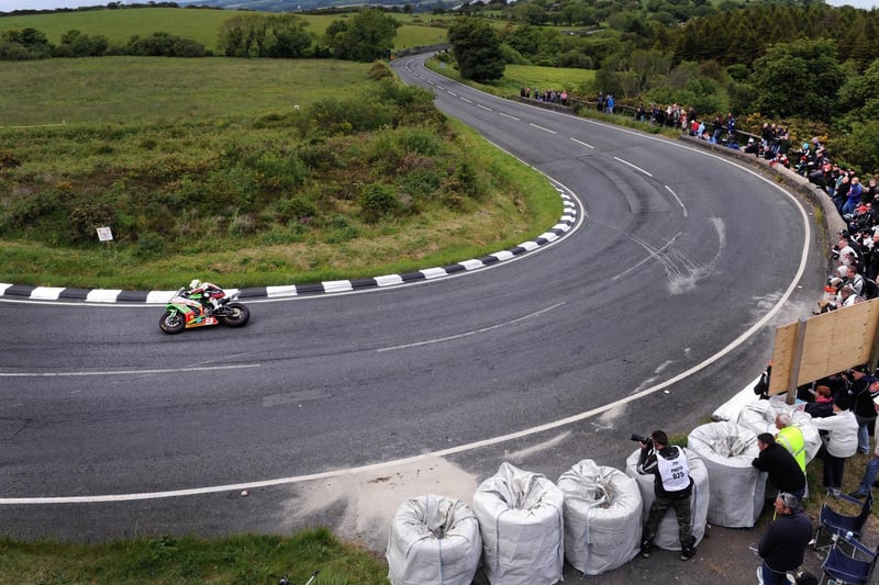 A stunning panoramic shot of Michael Dunlop at the Gooseneck in the 2011 Superstock race at the Isle of Man TT.