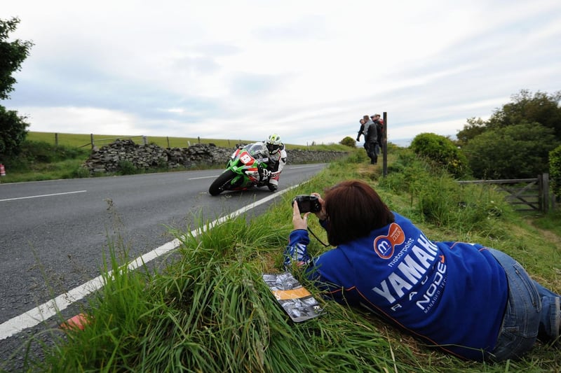 Michael Dunlop on the approach to the Gooseneck on the MD Racing/Street Sweep Kawasaki in the Superstock race at the 2011 Isle of Man TT.