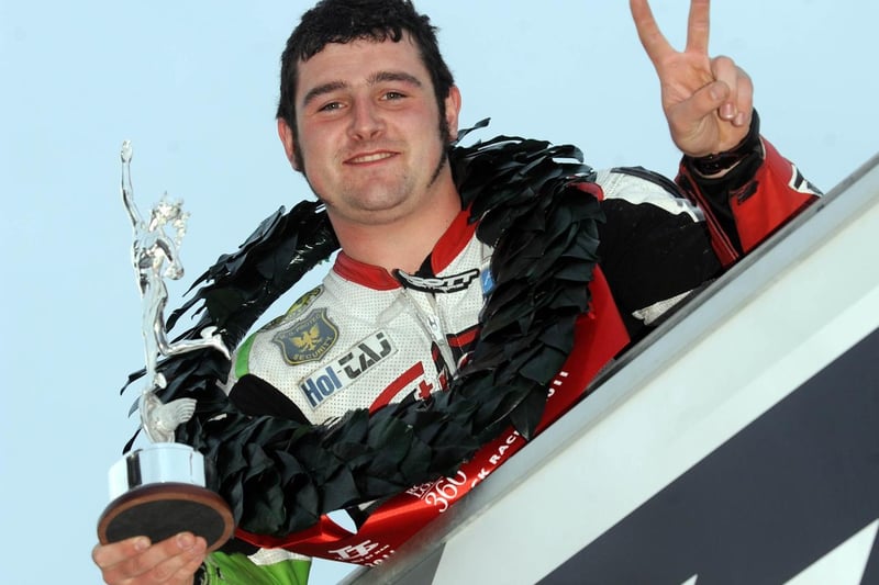 Northern Ireland's Michael Dunlop celebrates his Superstock victory at the 2011 Isle of Man TT - his second career win at the time. Dunlop is today the third most successful TT rider ever with 19 wins behind his uncle Joey with 26 and John McGuinness, who has 23.