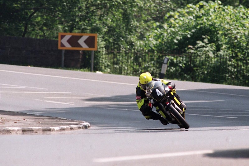 Ian Lougher on his way to victory in the Ultra-Lightweight TT in 1997.