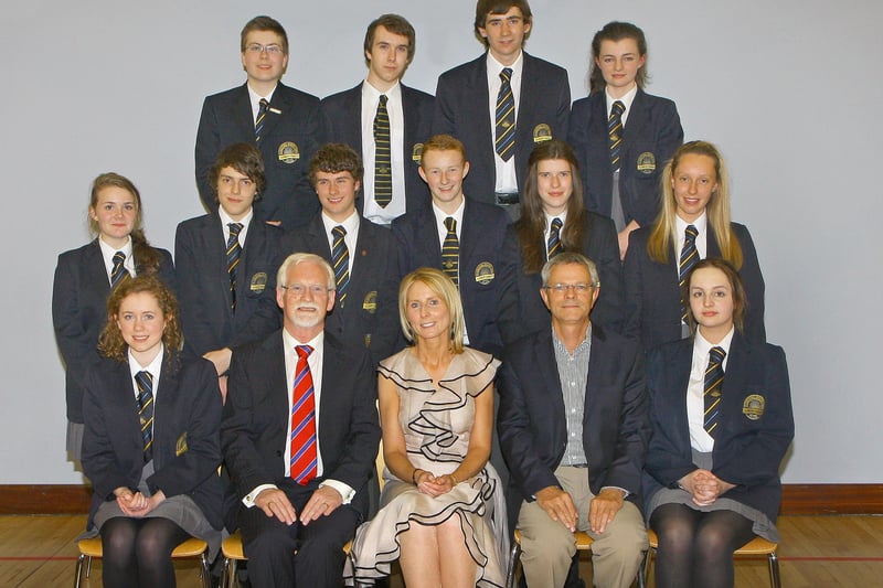 Lumen Christi college pupils who achieved 8 grade ‘A’ or better in GCSE examinations, pictured at the College’annual senior prize giving, pictured with seated (second from left), Mr. John Boyle, chairperson Board of Governors, Mrs. Bronach O’Hara, Head of Key Stage 4 and Mr. Claude Metzdorf,  Du Pont plant manager. Picture.  Maurice Thompson.