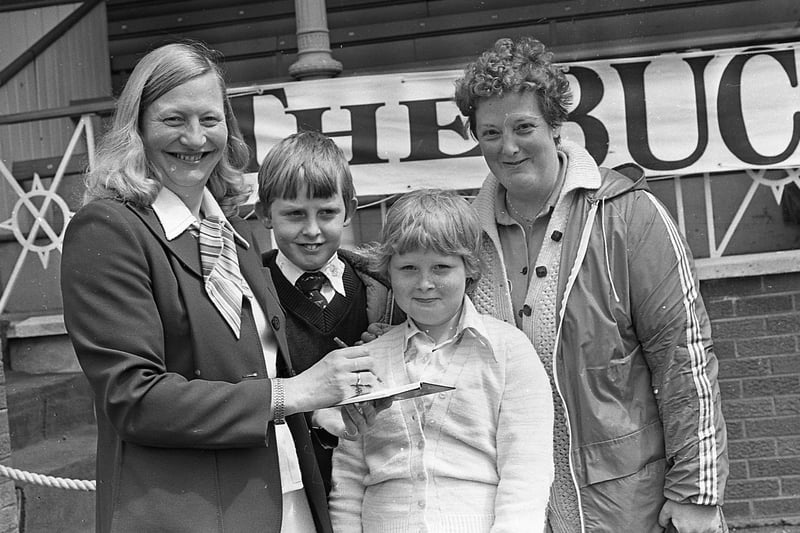 Mary Peters signs an autograph for Mrs Isobel Harbinson and her children Kyle and Jennifer at the Balmoral Show in May 1981. Picture: News Letter archives