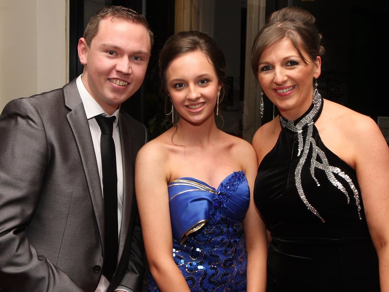 School teacher Rita Mullan (right), with students Gary Hetherington and Laura Canning, arriving for the Lisneal College annual formal dinner in the Everglades Hotel. INLS 1248-511MT.
