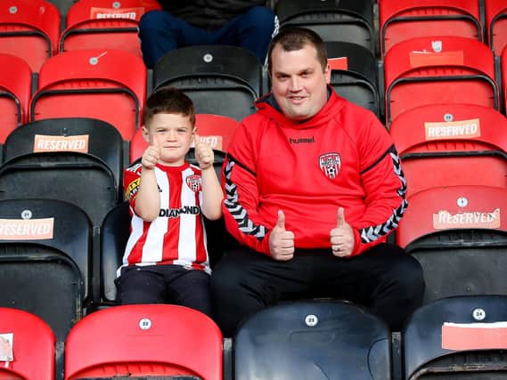 Five year-old Celeb Toland and his father Richie give our photographer the thumbs up on their return to Brandywell Stadium. Photos by Kevin Moore.