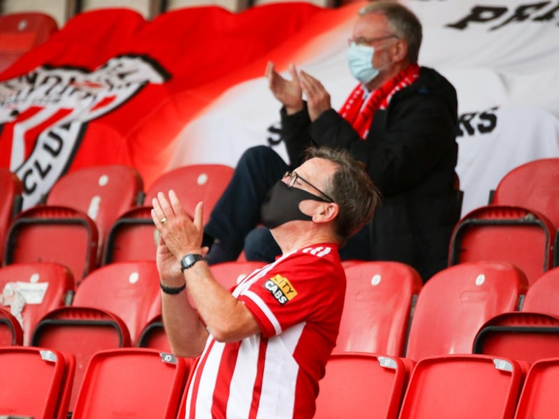Local referee and Derry City fan Dick Tucker making his presence felt in the Southend Park stand.
