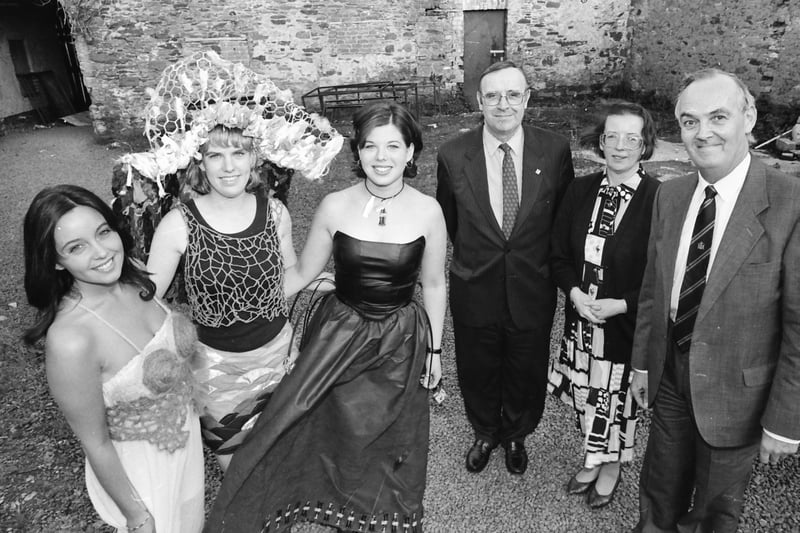 Fashion students from Limavady College with some of their designs at a Fashion Show in June 1996. From left,Emma Birney, Michelle Steen and Irene Quigley. Included, from right, Professor Bill Watts, Iris Millar and Robin McAfee, admissions officer, University of Ulster, special guests.