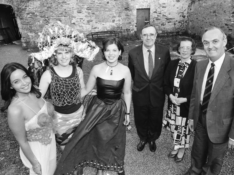 Fashion students from Limavady College with some of their designs at a Fashion Show in June 1996. From left,Emma Birney, Michelle Steen and Irene Quigley. Included, from right, Professor Bill Watts, Iris Millar and Robin McAfee, admissions officer, University of Ulster, special guests.