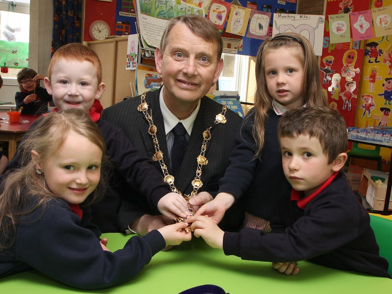 St. Oliver Plunkett primary school, Strathfoyle, class P1 pupils Mia Brolly, Caden Doherty, Shantel Doherty and Harry Delaney, get to touch the Mayoral chain of office when the Mayor of Derry Alderman Maurice Devenney, was on a courtesy visit to the school.