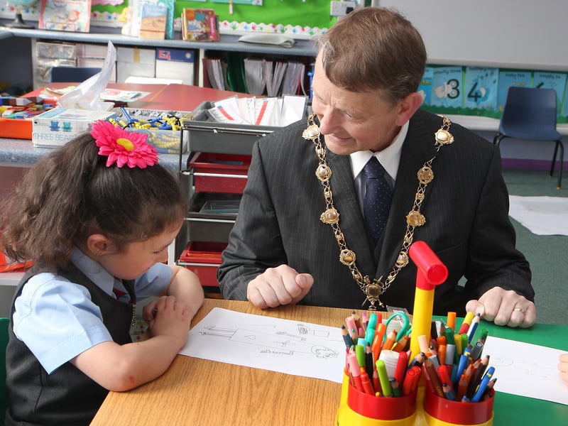 The Mayor of Derry Alderman Maurice Devenney, talking with P1 pupil  Chiyanne McGrotty, during his  courtesy visit to Mullabuoy primary school.