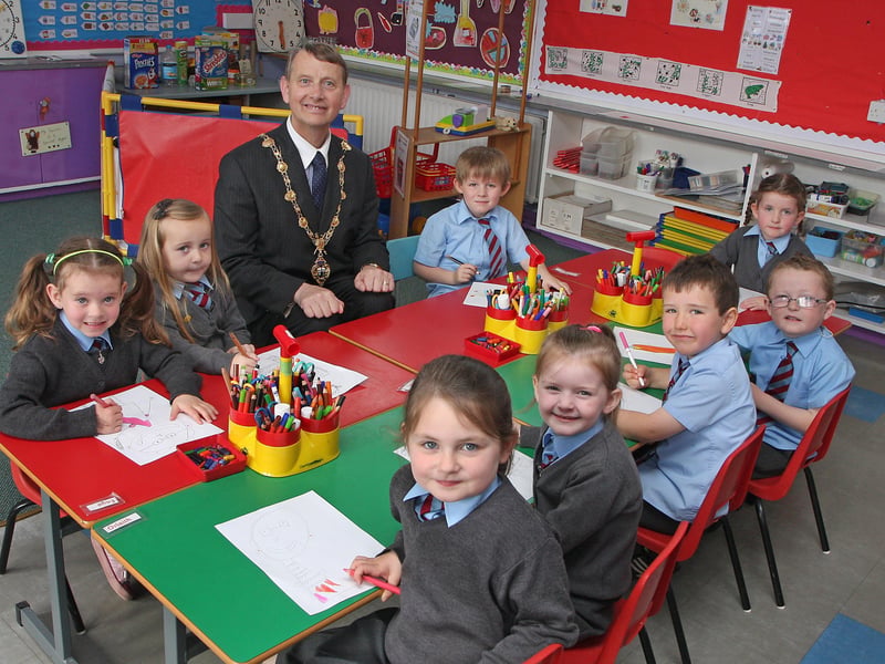 The Mayor of Derry Alderman Maurice Devenney, sits-in with P1 pupils during his courtesy visit to Mullabuoy primary school.