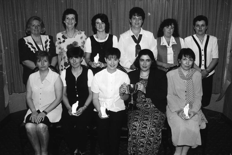 Members of the Inishowen Ladies Darts Committee pictured with members of the Fisherman’s Bar, Glengad, winners of the McAteer Cup. Seated, from left, are Ann McLaughlin, treasurer, Jackie McColgan, Finola McColgan, Caroline Harrigan, chairperson, and Marjorie McDaid. Standing, from left, are Sara McLaughlin, secretary, Lily Noone, vice-chairperson, Pauline McColgan, Melissa Kelly, Sarah Kirkland and Audrey Bredin.