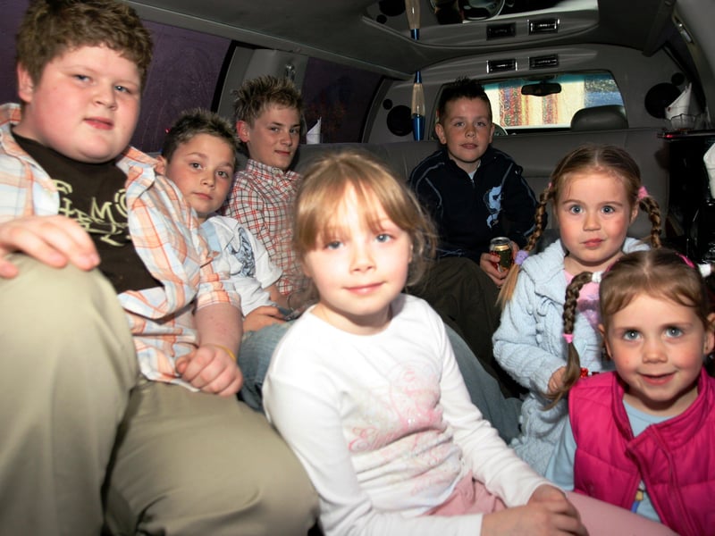 Philip and Brianna McLaughlin celebrate their birthday with friends with a limousine cruise.