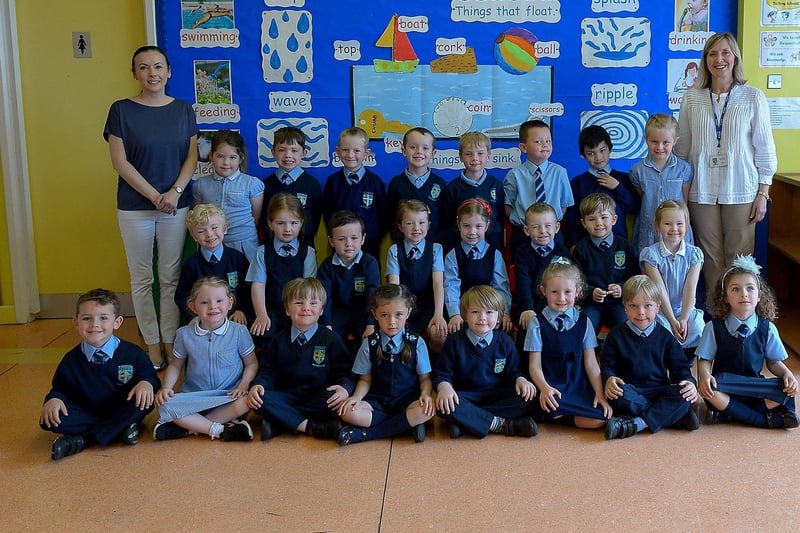 Mrs M. Harkin’s P1 class at Holly Bush Primary School, Derry. Included in the photo is classroom assistant Mrs Flood, on the left. DER2122GS – 046