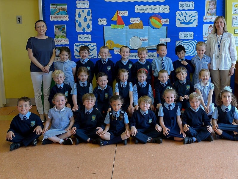 Mrs M. Harkin’s P1 class at Holly Bush Primary School, Derry. Included in the photo is classroom assistant Mrs Flood, on the left. DER2122GS – 046