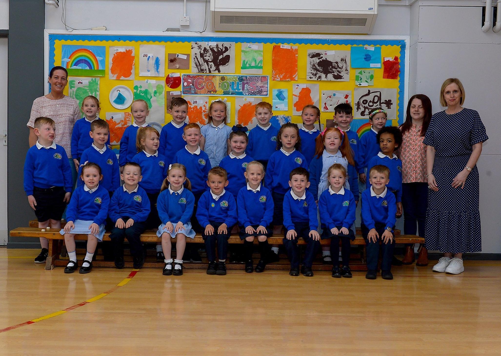Mrs P. Loughran (on the right) pictured with her P1 class, St Paul’s Primary School, Derry. Included in the photo are classroom assistants Mrs M. Carlin and Miss C. Doran. DER2122GS –  021