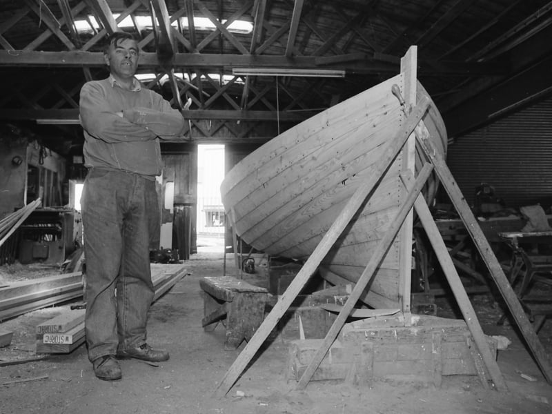 Brian McDonald, alongside the magnificent ‘Drontheim’ he built in Moville in July 1996.