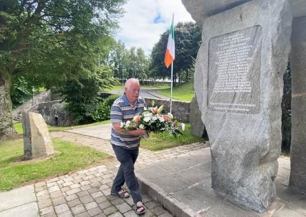 Eugene Lafferty, brother of Vol. Eamonn Lafferty lays a wreath during the commemorations. Eamonn was shot dead during a gun battle with the British Army in Creggan on August 18, 1971.