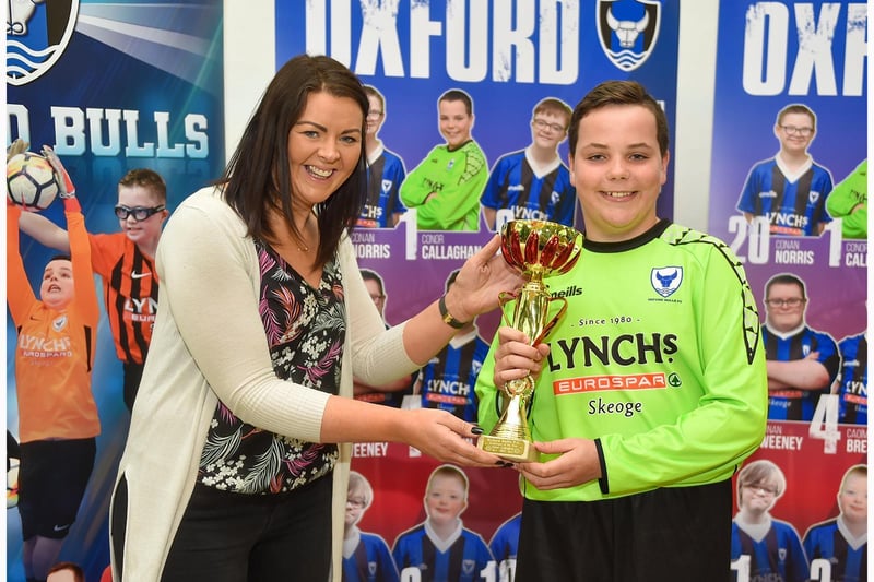 Goalkeeper of the year for 2021, Conor Callaghan receives his award from Denise  of Lynch’s Eurospar Skeoge.