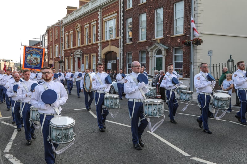 Lambeg Orange & Blue Flute Band showing respect at the Lisburn war memorial. Pic by Norman Briggs, rnbphotographyni