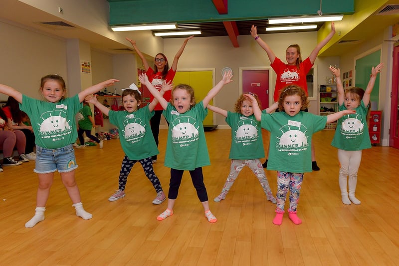 Lola, Leah, Beth, Aria and Lola, from Red Group, rehearsing, with volunteers Holly and Chantelle at the Studio 2 Annie themed Summer Scheme pictured earlier this week. Photos: George Sweeney DER2127GS - 008