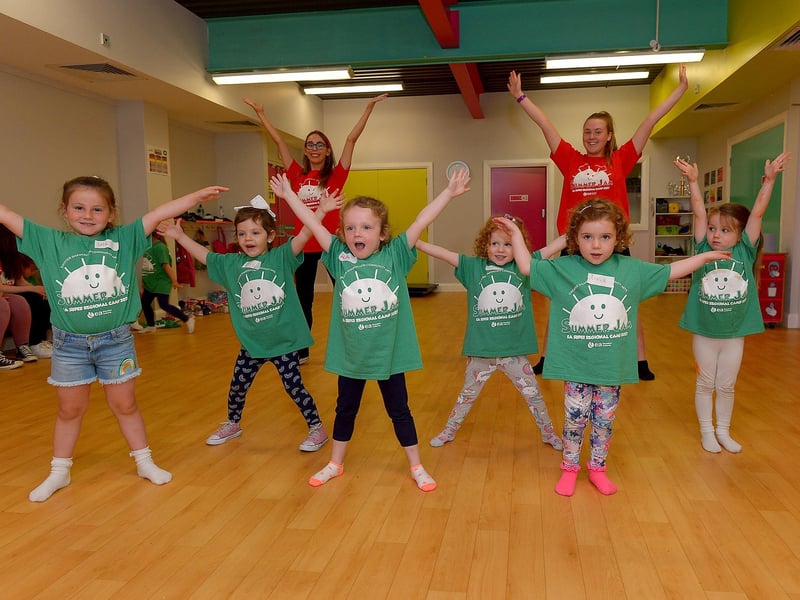 Lola, Leah, Beth, Aria and Lola, from Red Group, rehearsing, with volunteers Holly and Chantelle at the Studio 2 Annie themed Summer Scheme pictured earlier this week. Photos: George Sweeney DER2127GS - 008