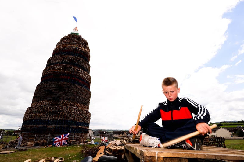 Nine-year-old Elijah Crusie practises the drums at the site of the Craigyhill bonfire in Larne.  Picture by Jonathan Porter/PressEye