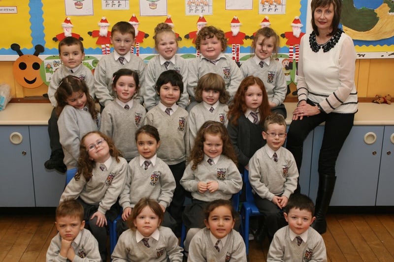 Mrs. Herron with her P1 class at St. Eugene's Primary School, Derry. DER5013JM070