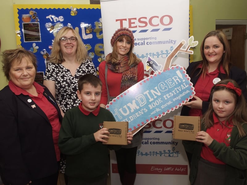 Pictured at the presentation of Junior Writer's Packs to P5 puplis at Eglinton Primary School as part of the Humdinger Children's Book Festival were, from left, Irene Hewitt, Tesco Community Champion, Sarah Hughes, Sponsorship Manager, Culture Company, Josh Lewers, Trisha Deery, Dog Ears publishers, Audrey Kincaid, Tesco Community Champion, and Ella McKnight. INLS4313-154KM