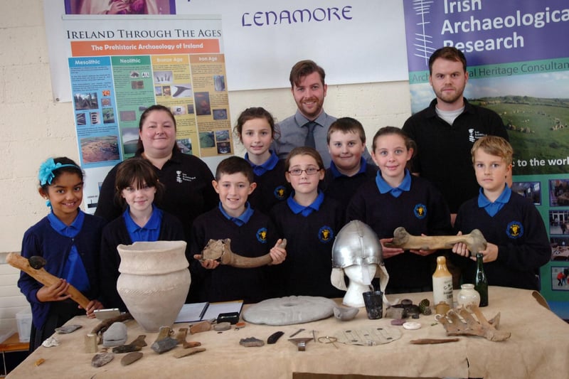 Back row, from left, Leanne Heany, Gavin Donaghy and Cormac Duffy from Irish Archaeological Research visit St Therese's Primary School for an educational talk and to display artifacts found in Ireland and beyond, part of their programme to visit schools throughout Derry and Inishowen. Included are pupils, from left, Sorena, Rachel, Keelan, Ellie, Shanice, Dillan, Sarah-Lee and Kiernan. (DER4013PG196)