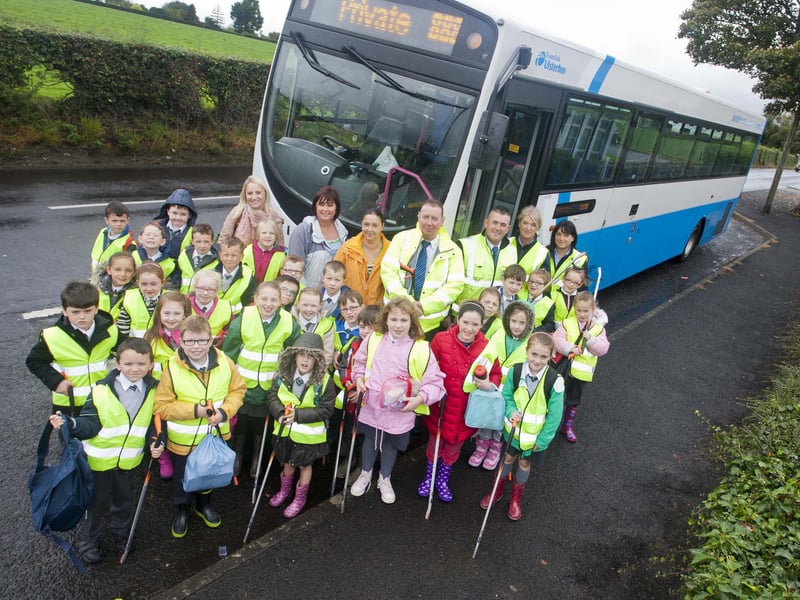 LITTER PICK-UP. . . Primary 3 and 4 pupils from Glendermott Primary School, Ardmore, who travelled to Ness Woods on Thursday to conduct a litter pick, in conjunction with Translink, as part of their Tidy Translink Programme and their Biodiversity/Environmental Initiative, with sponsors from Derry City Council and McDonalds. Pictured, back from left are, Julie Kelly (Teacher), Linda McLaughlin (Classroom Assistant), Shiela Walker (Classroom Assistant), and from Translink, Raymond Edwards, Gavin McShane, Rose Edwards and Marie Baird. 0910-GMI-01