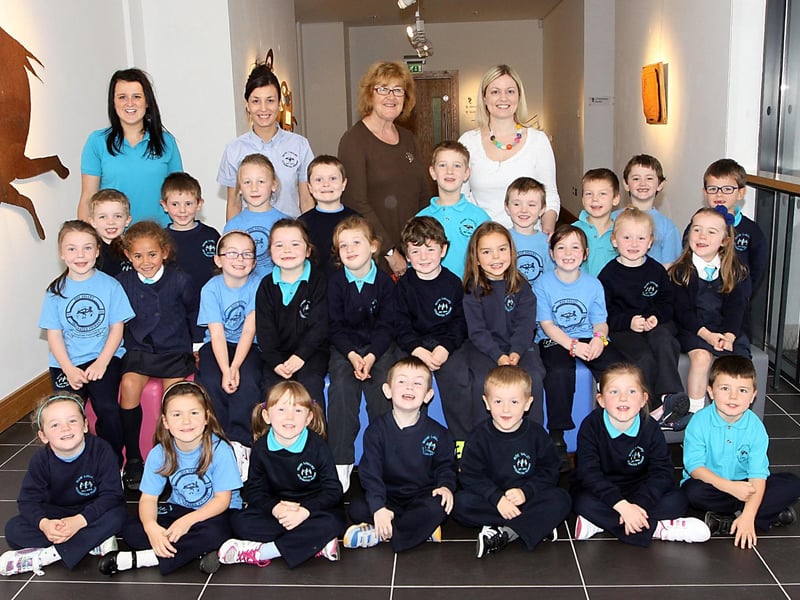 P2 pupils from Roe Valley Integrated Primary School pictured before a storytelling session with Liz Weir at the Roe Valley Arts Centre this week. The pupils are pictured with Liz, teacher Miss Rhonda Robinson and classroom assistants Teresa Kelly and Shauna Wilson. DER3913JM020