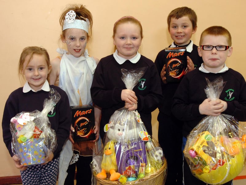 Children from Bunscoil Cholmcille who were prizewinners in the fundraising Easter raffle for Trocaire. They are, from left, Laura, Shannon, Toni, Pluincead and Jason. (2903PG26)