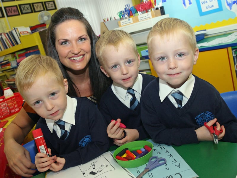 TRIPLETS AT ROSEMOUNT!. . . . The McLaughlin triplets, Cian, Gary and Ryan, P1 starters at Rosemount PS, pictured on Friday with teacher, Mrs. Burton. Principal, Mr. Brendan Grant believes its a 'first' for the school. DER3713JM80