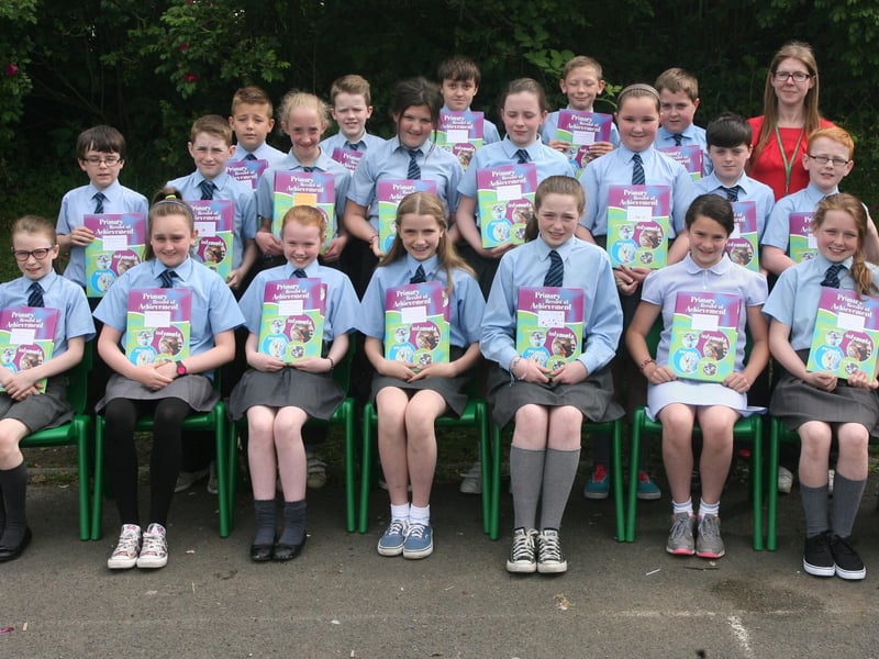 Mrs. Suzanne McGrory's P7 class at St. Anne's PS, Rosemount, pictured this week after receiving their 'Records of Achievement' awards at the annual prizegiving. 2506JM03