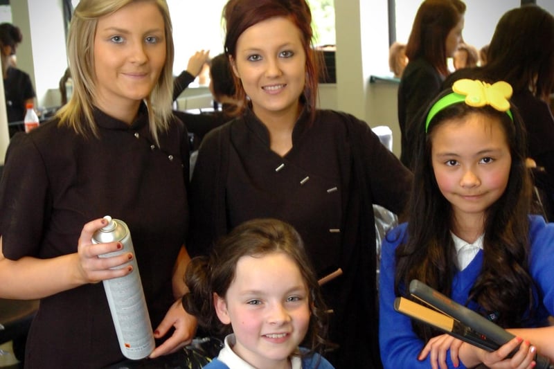 Termoncanice Primary School pupils Mia Doherty, seated, and Sinead Heaney enjoy Tuesday's pamper session with North West Regional College Hair and Beauty Academy students Laura Bradley, left, and Edelle Bradley. (2405PG21)