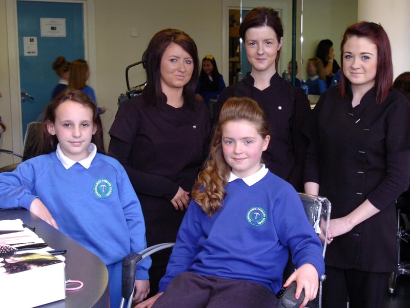 Termoncanice Primary School pupils Emer Hegarty, left, and Jodie Canning pictured during their pamper session with North West Regional College Hair and Beauty Academy students, from left, Gemma McLaughlin, Demi Robinson and Shannon Blair. (2405PG23)