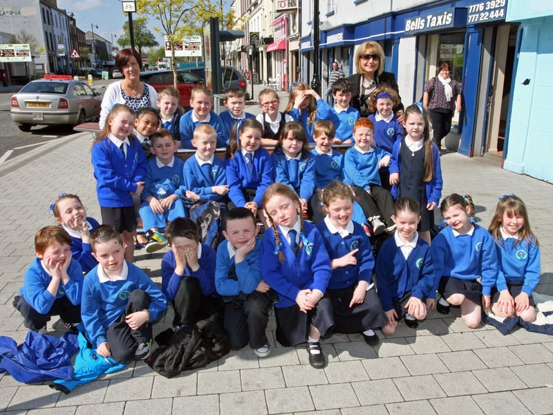 WELL DONE!. . . Mrs. McCloskey with her P3 class from Termoncanice Primary School, Limavady who picked up a distinction for their performance of 'Who Nicked Grandad's Ashes' at the Speech and Drama Festival on Friday morning. On right at back is Mrs. Harron, Acting Principal. 2905JM23